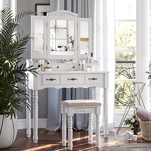 Dressing table with 7 Drawers, Makeup Table with Tri-Fold Necklace Hooked Mirror, 2 Brush Slots and 4 Open Compartments, Solid Wood Legs, Cushioned Stool, White